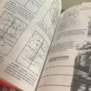 Páginas abertas com exercícios de desenho de paisagem
